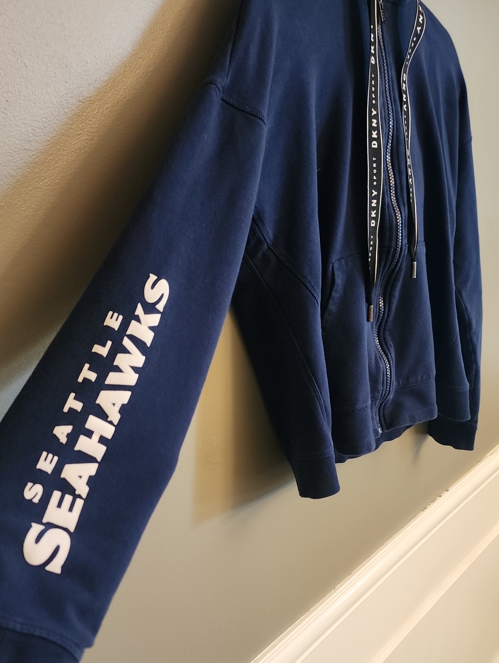 DKNY Seattle Seahawks Navy Full-Zip Crop Hoodie with Branded Drawstrings - Picture 2 of 16